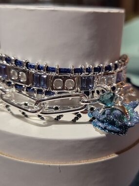 Silver-Tone Blue Layered Charm Bracelet with Sparkling Flower Accent